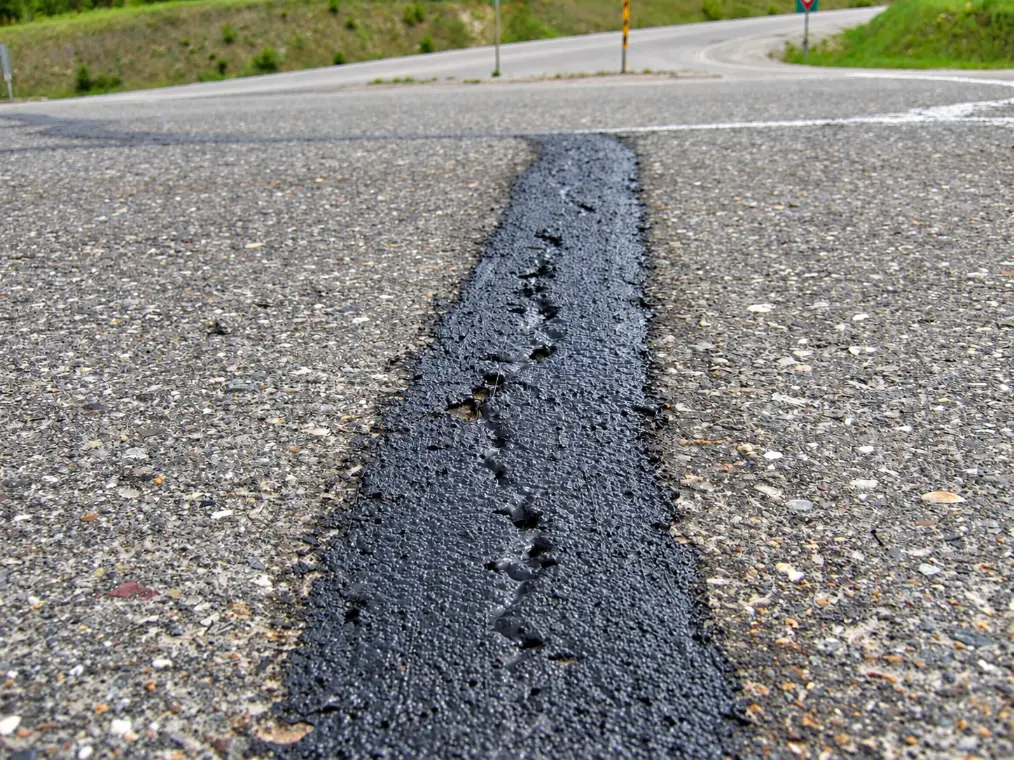 Inspecting asphalt surface damage