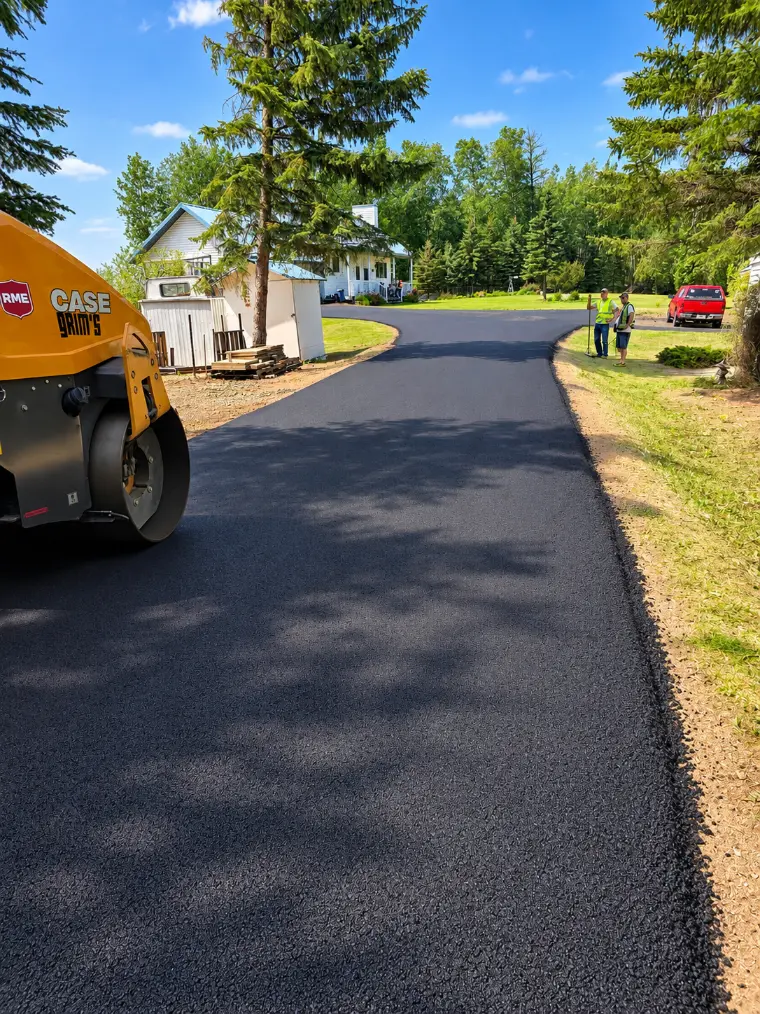 New Era Paving crew at sunset