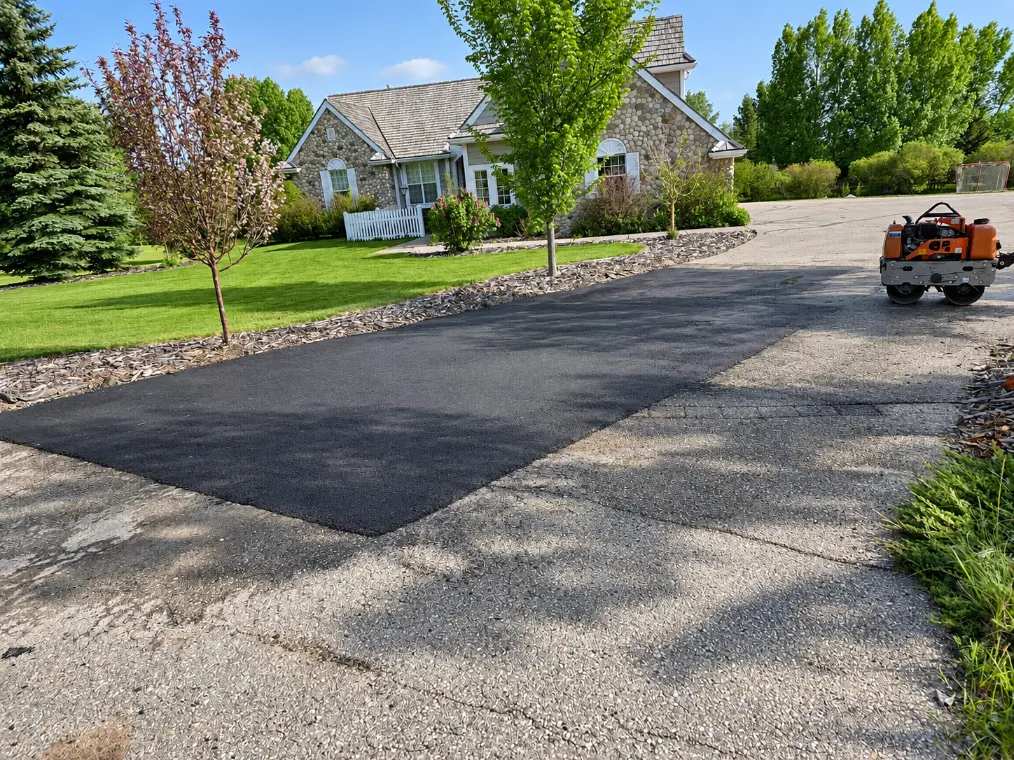 Damaged asphalt ready for patching